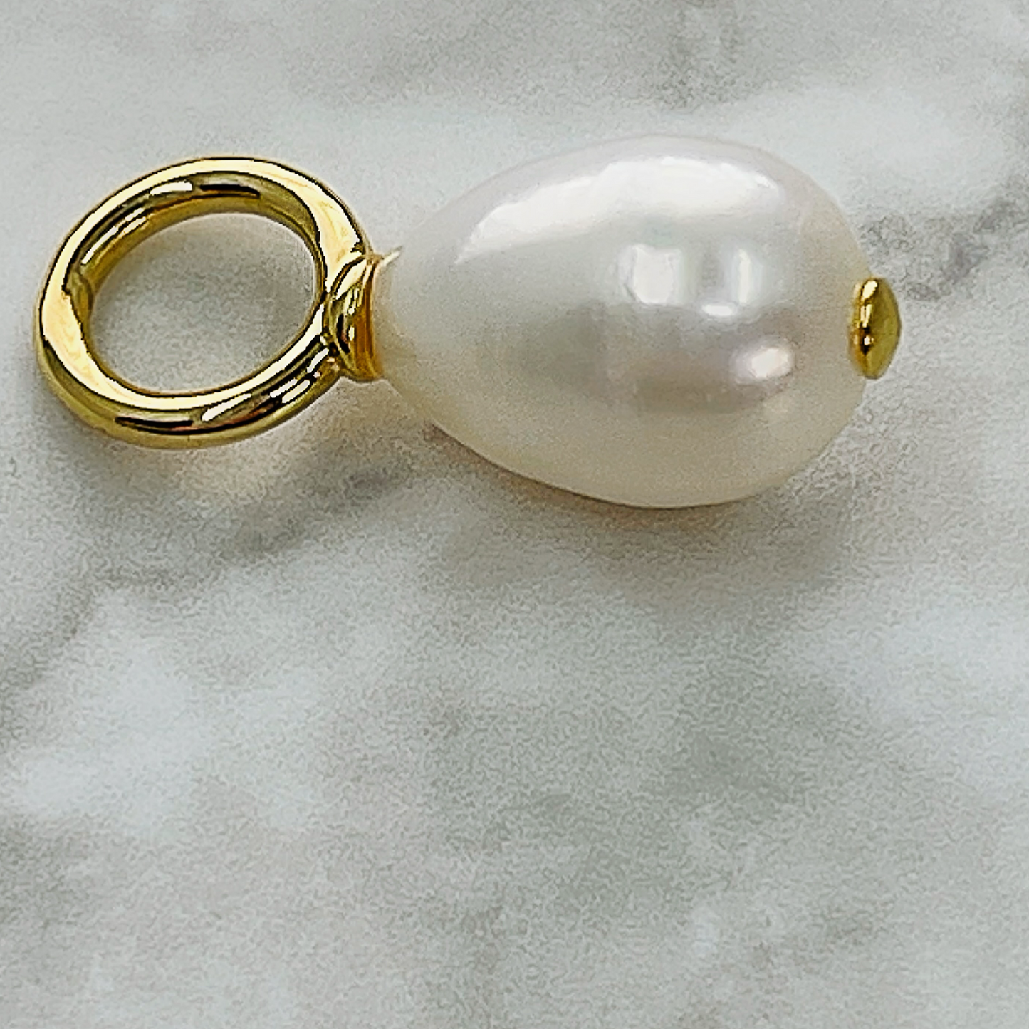 White freshwater pearl charm