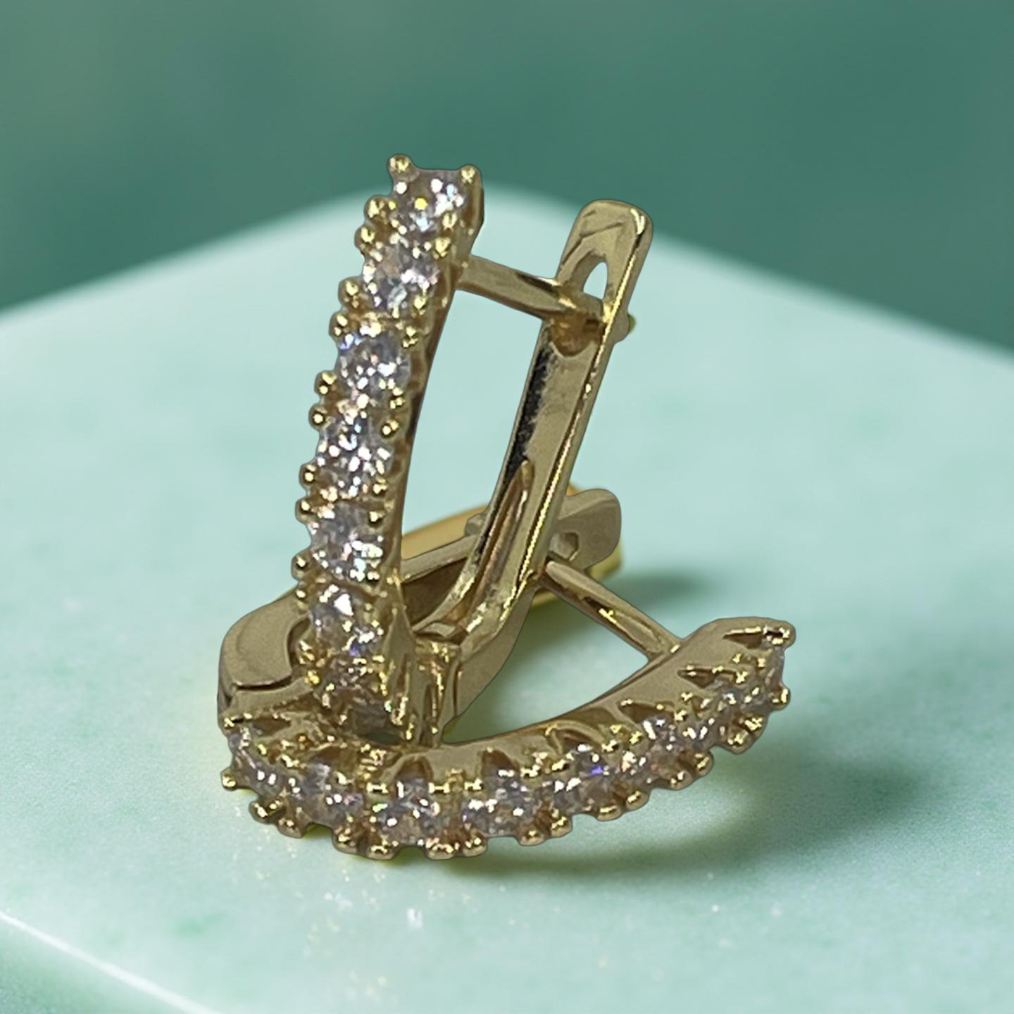 BREE English lock gold and cz huggies