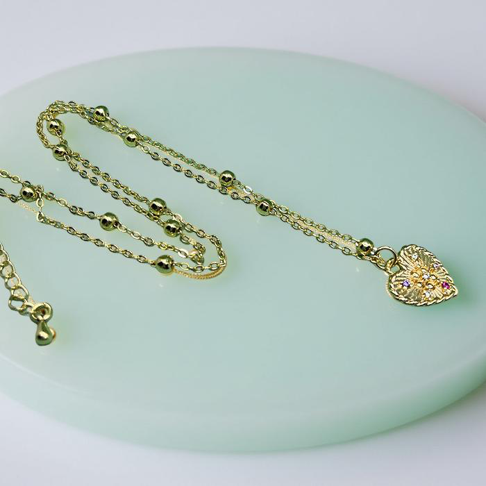 CELESTE goldener Herzanhänger mit goldener Perlenkette