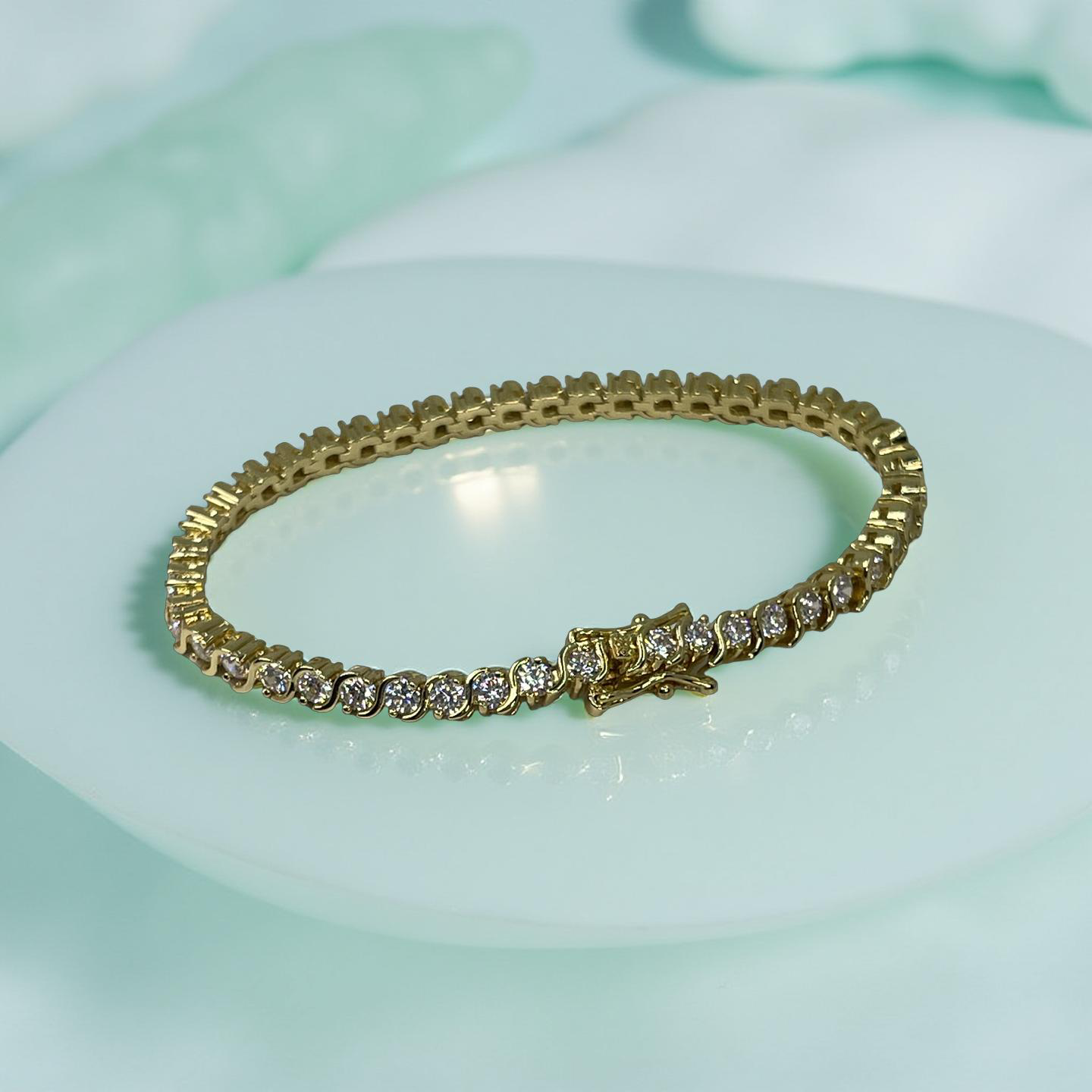 CURVE gold and cubic zirconia s-curve tennis bracelet