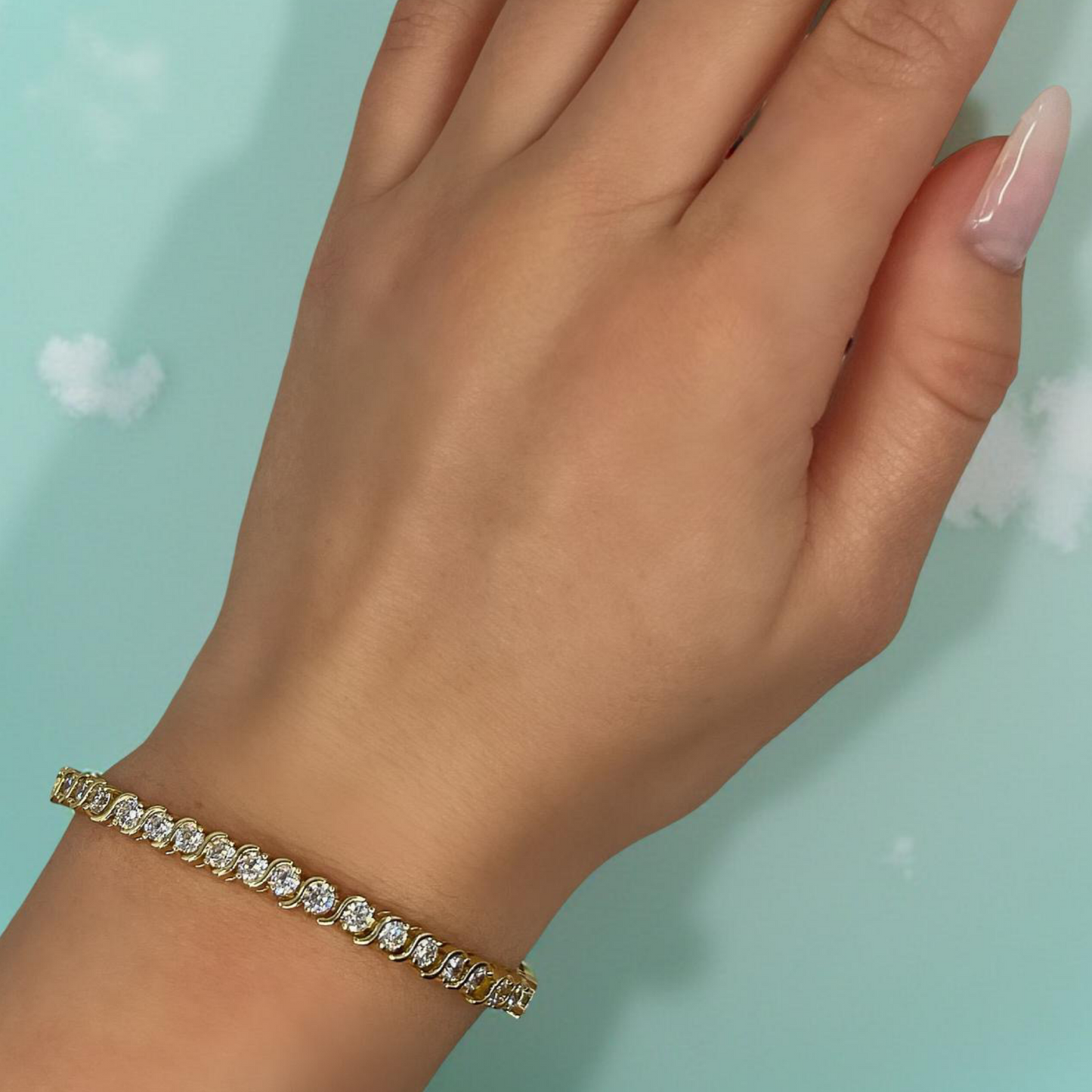 CURVE gold and cubic zirconia s-curve tennis bracelet