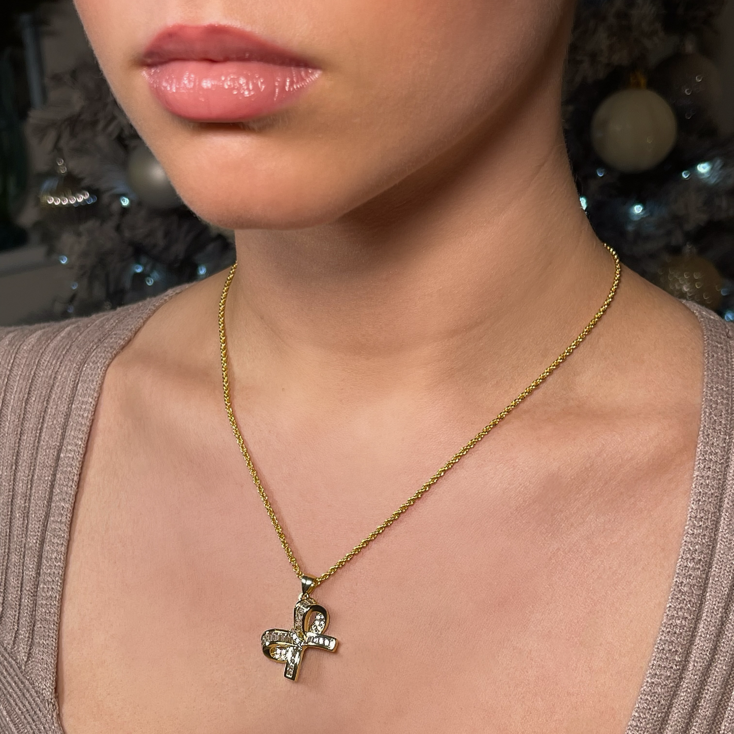 LARA gold and pave baguette cz bow pendant