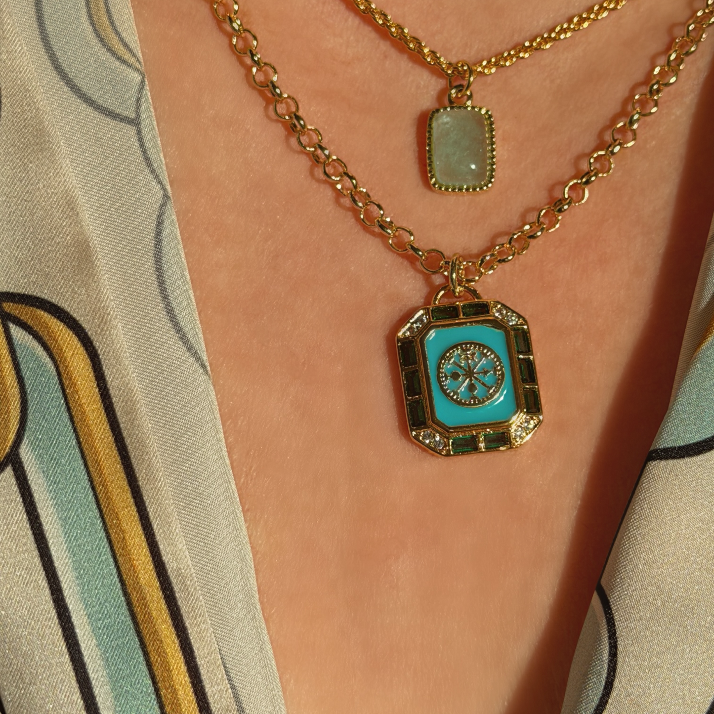 MAGS gold enamel and cz pendant