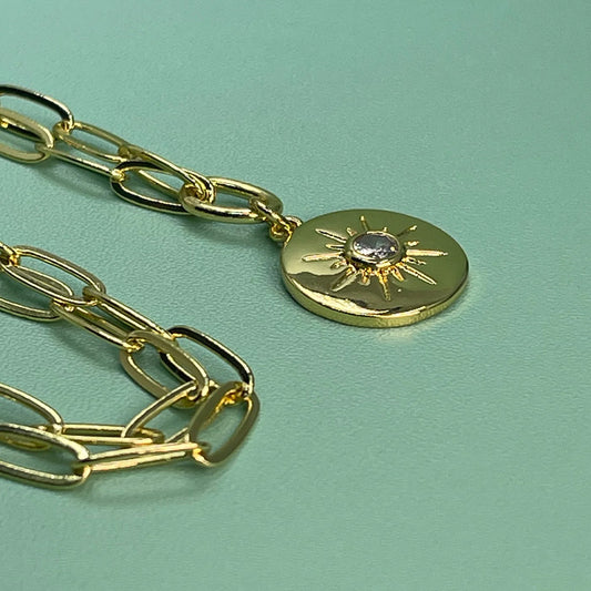 NAXOS gold pendant necklace