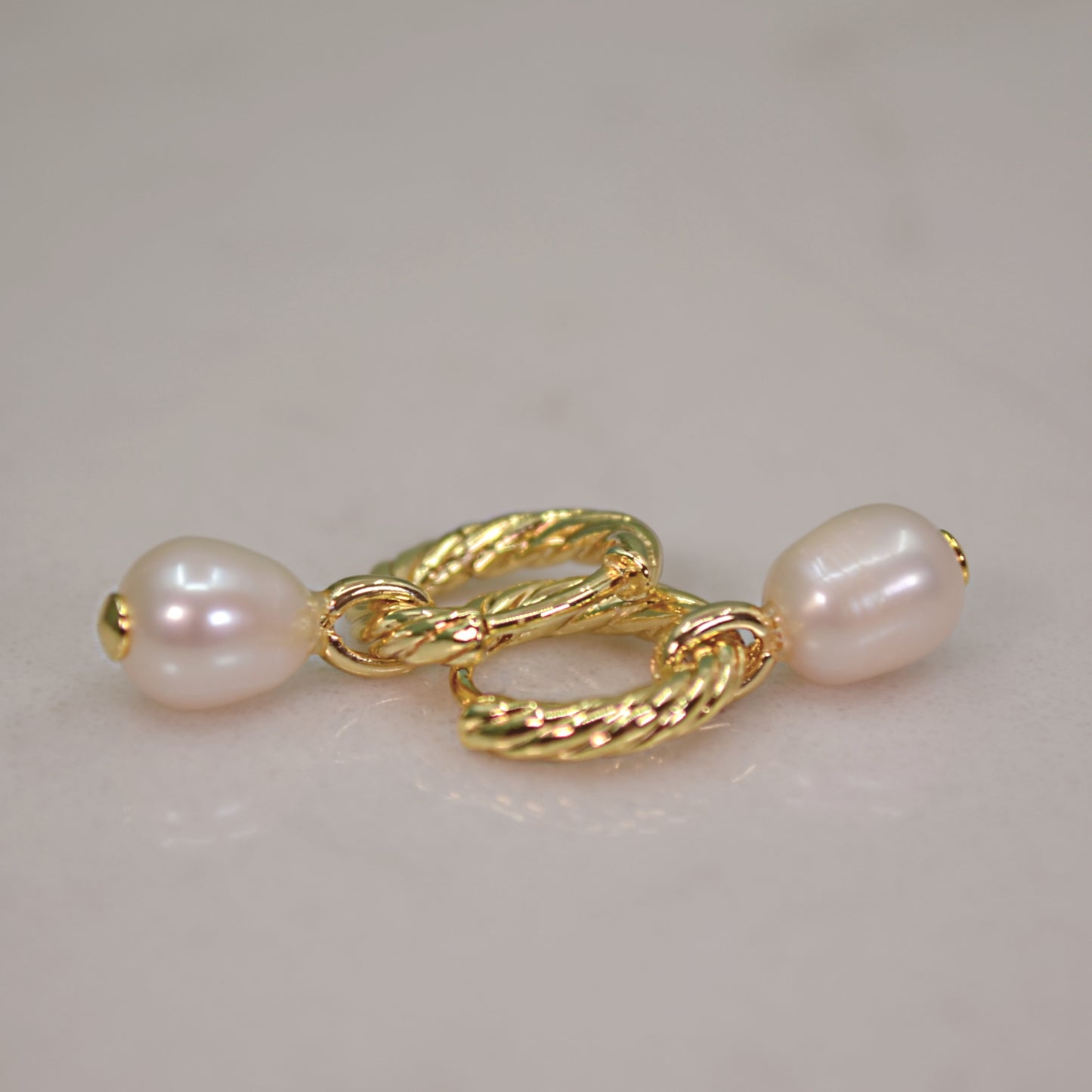 PIP gold twist and freshwater pearl huggies