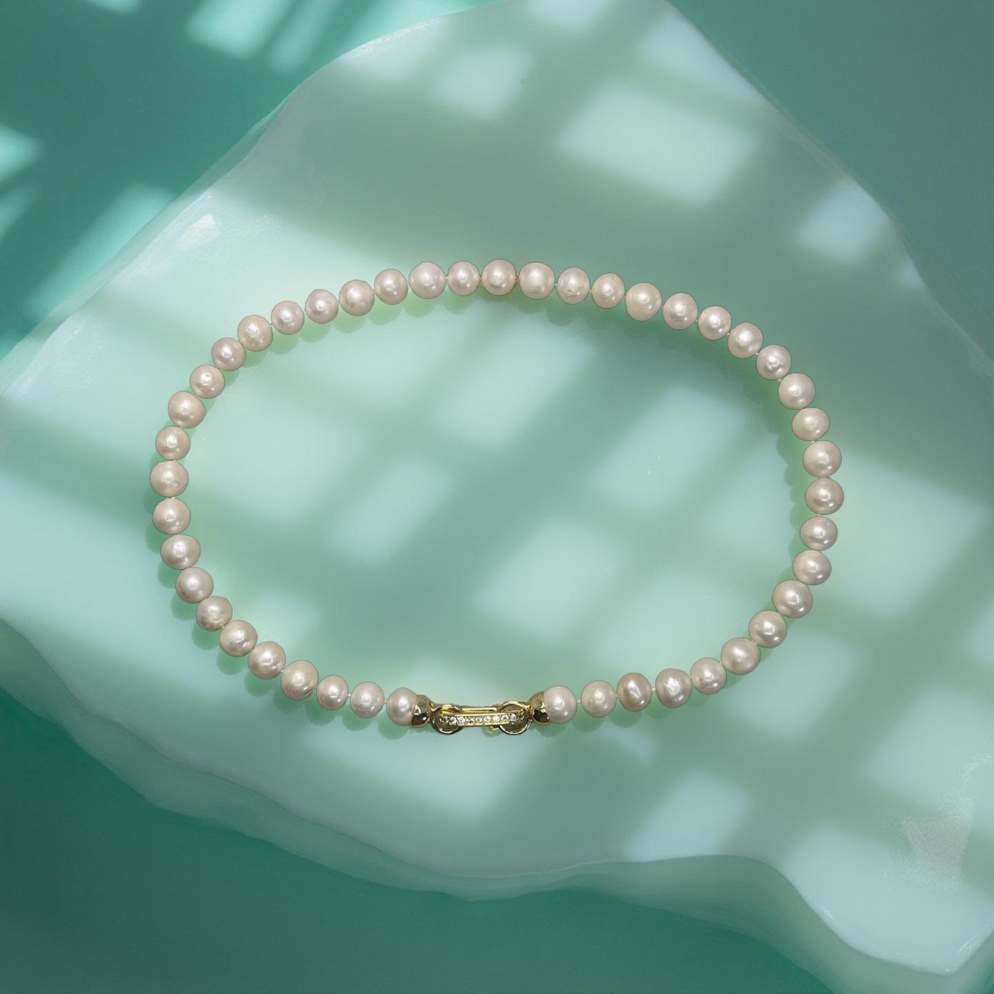 ROMY freshwater pearl hand-knotted necklace with pave clasp