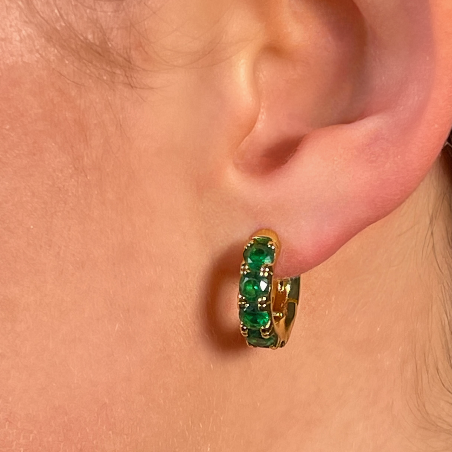SMERELDO gold and emerald cz huggies