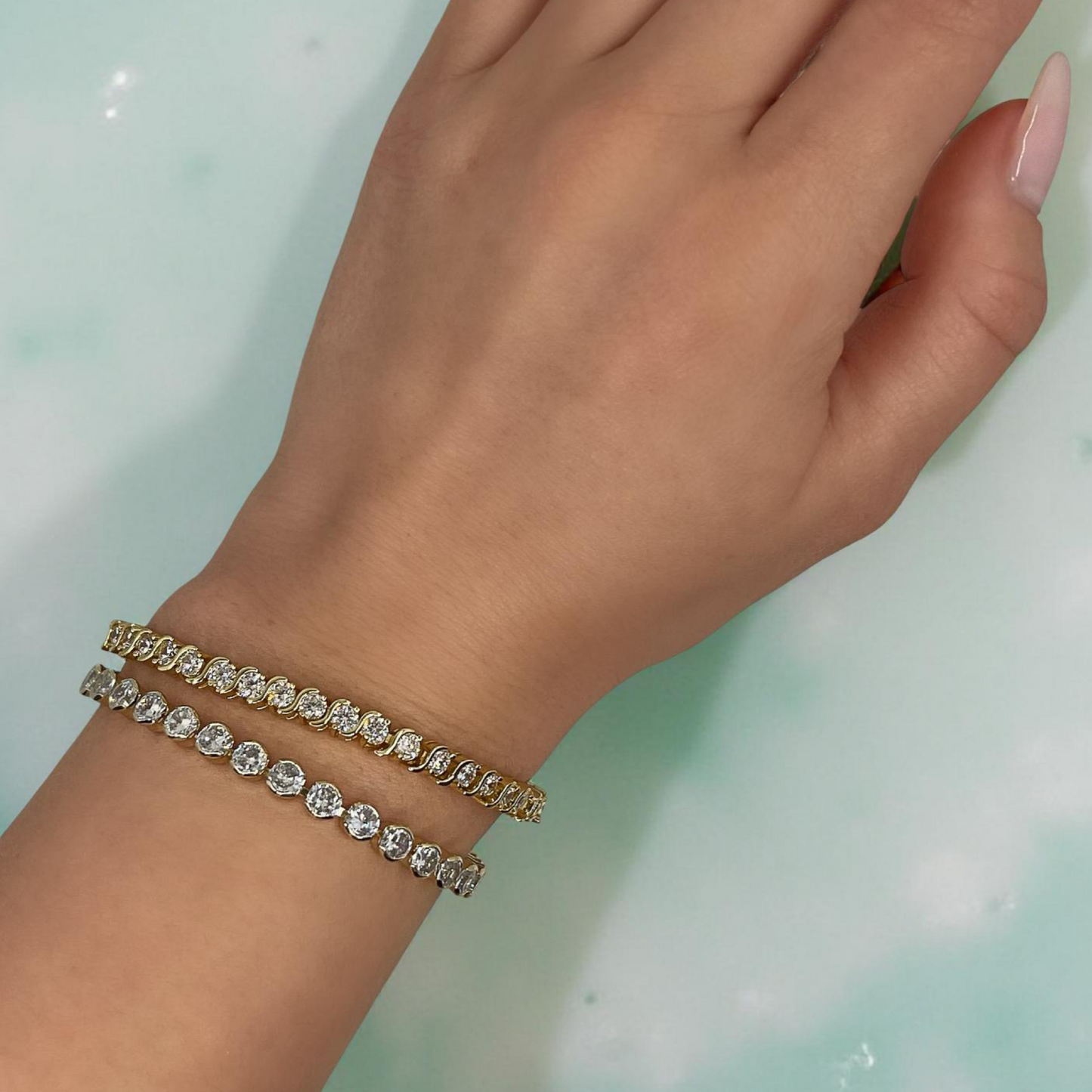 TONI gold and cz round bezel tennis bracelet